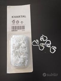 Binari e ganci per tende Kvartal