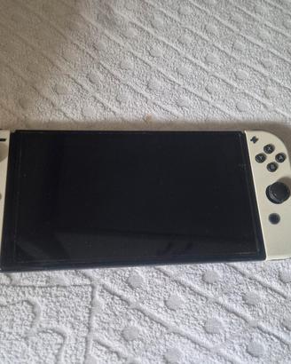 switch oled +9 giochi 
