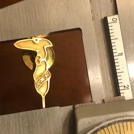 Bottone Trussardi 0ro 18K