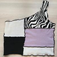 Top monospalla con fantasia zebrata