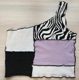 Top monospalla con fantasia zebrata