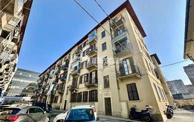 TRILOCALE COMODO ALLA METRO CON POSTO AUTO.