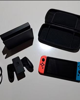 Nintendo Switch rossa e nera + accessori +3 giochi