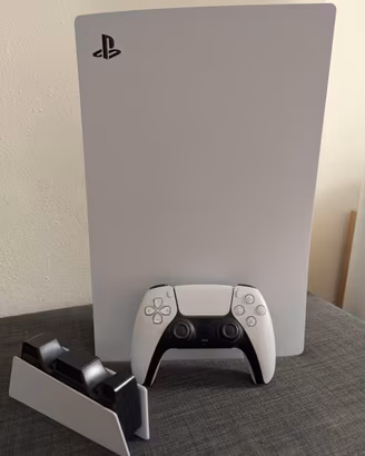 PS5 Disc Edition + Base ricarica + 6 Giochi