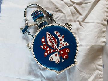 Bottiglietta vintage rivestita in pelle