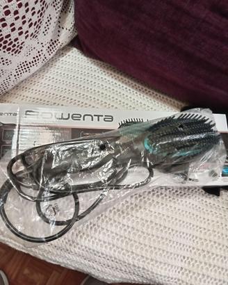 Piastre e spazzola lisciante