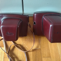 Due scatole box in pelle della Leica per fotografi