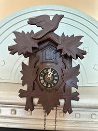 Orologio a Cucù in legno intagliato