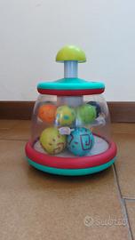 TROTTOLA COLORATA CON PALLINE
GIOCO SENSORIALE