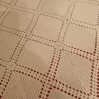 Coperta quadrata in filet waffle tassellata