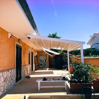 Pergotende tettoie e chiusure