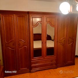 camera da letto e credenza 