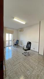 Stanza in ufficio condiviso
