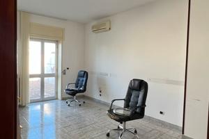 Stanza in ufficio condiviso
