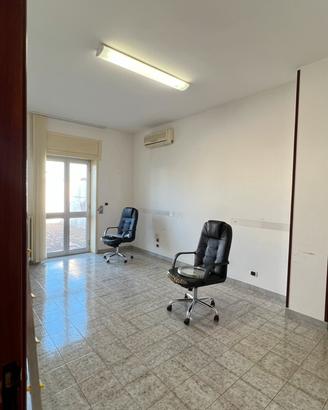 Stanza in ufficio condiviso