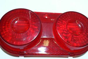 VETRO FANALE POST AF1 APRILIA TRIOM 220021