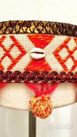 Cintura danza arancione con conchiglie e pom pon