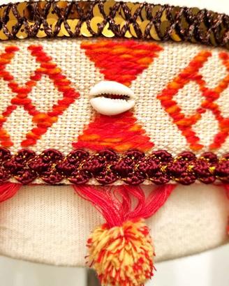 Cintura danza arancione con conchiglie e pom pon