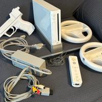 Wii console con 1 telecomando e accessori in foto