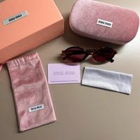 Occhiali Miu Miu MU04ZS