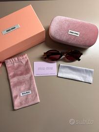 Occhiali Miu Miu MU04ZS