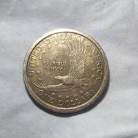 Monete One dolar e Quarter dolar