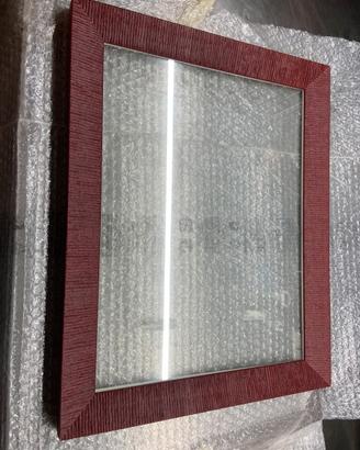 Cornice artigianale in legno