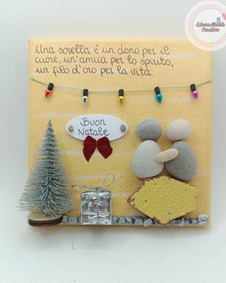 Quadretto natalizio handmade con sassi Sorella