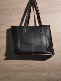 borsa Carpisa in pelle bicolore nera e beige