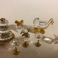 Swarovski collezione 7 pezzi (torta, passeggino.)