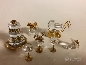 Swarovski collezione 7 pezzi (torta, passeggino.)