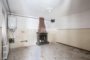 Porzione di casa su più livelli con corte esclusiv