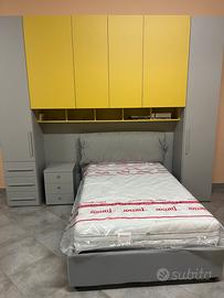 Cameretta a ponte color grigio e giallo