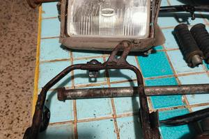  Ricambi Yamaha tw 200/125  faro supporto faro ecc