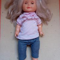 Bambola che cammina e canta.