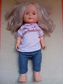 Bambola che cammina e canta.