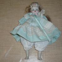 Bambola vintage da collezione con viso in ceramica