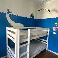 Letto a castello con scivolo