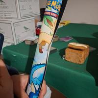 tappetino Eevee evoluzioni prismatiche 