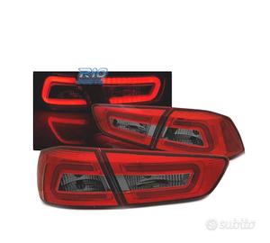 FANALI MITSUBISHI LANCER 8 SEDAN 08-11 BAR LED ROS