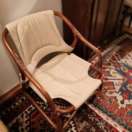 poltroncina vintage di tela e legno