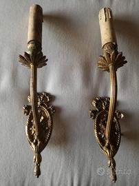 Applique in ottone