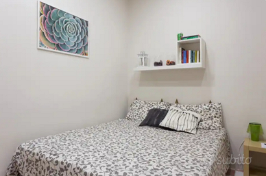 Camera con bagno privato e balcone