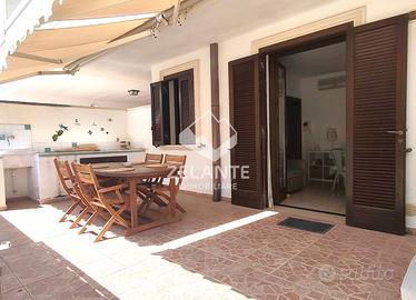 Appartamento con veranda e posto auto