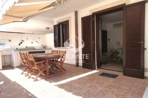 Appartamento con veranda e posto auto