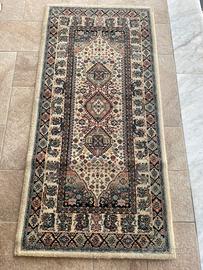 Tris tappeti in lana