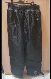 Pantaloni antipioggia più Paraschiena 