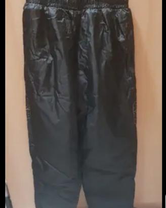 Pantaloni antipioggia più Paraschiena 