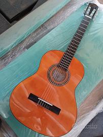 chitarra classica /custodia e libro per imparare