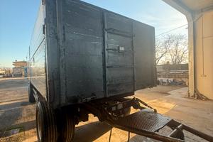 Rimorchio ribaltabile bilaterale